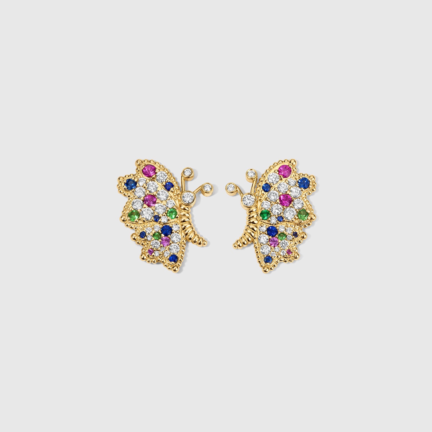 Butterfly Bloom stud earrings in solid 14K yellow gold with multicolored sapphires, tsavorites and white diamonds, photographed against a white background