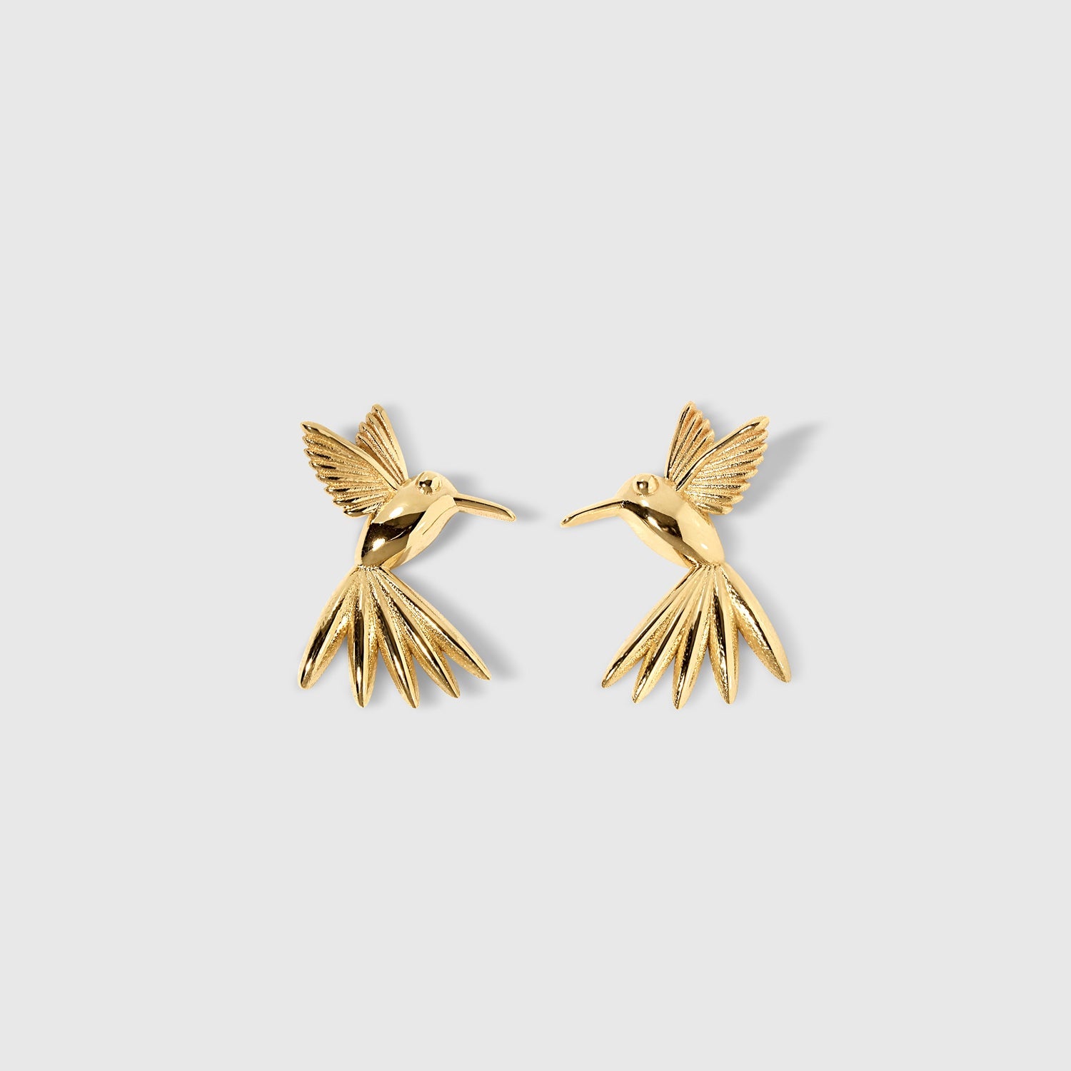 Golden Hummingbird stud earrings in solid gold from the Humming Beauty collection by Aurora Laffite Jewelry.