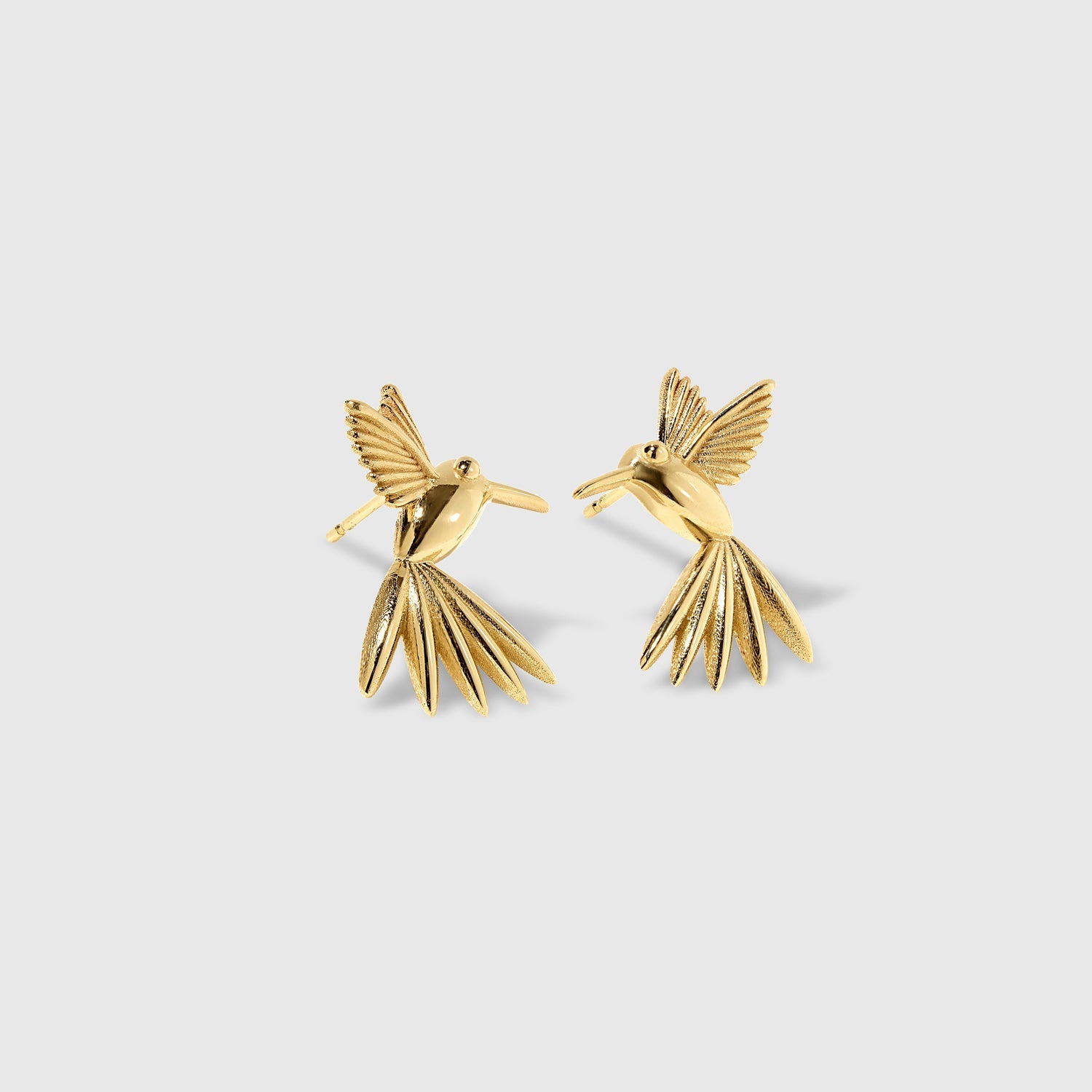 Golden Hummingbird stud earrings in solid gold from the Humming Beauty collection by Aurora Laffite Jewelry